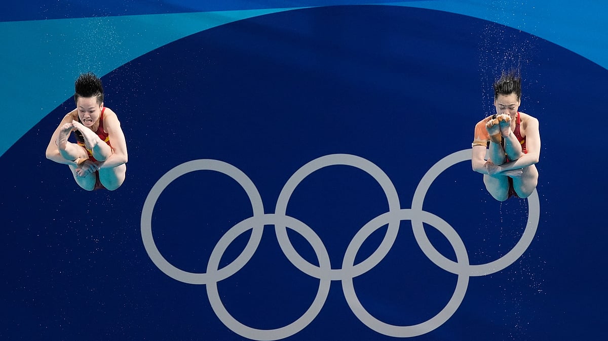 (AP Photo/Lee Jin-man)
 : China's Chen Yiwen and Chang Yani compete in the women's synchronised 3m springboard diving final at the 2024 Summer Olympics, Saturday, July 27, 2024, in Saint-Denis, France. 